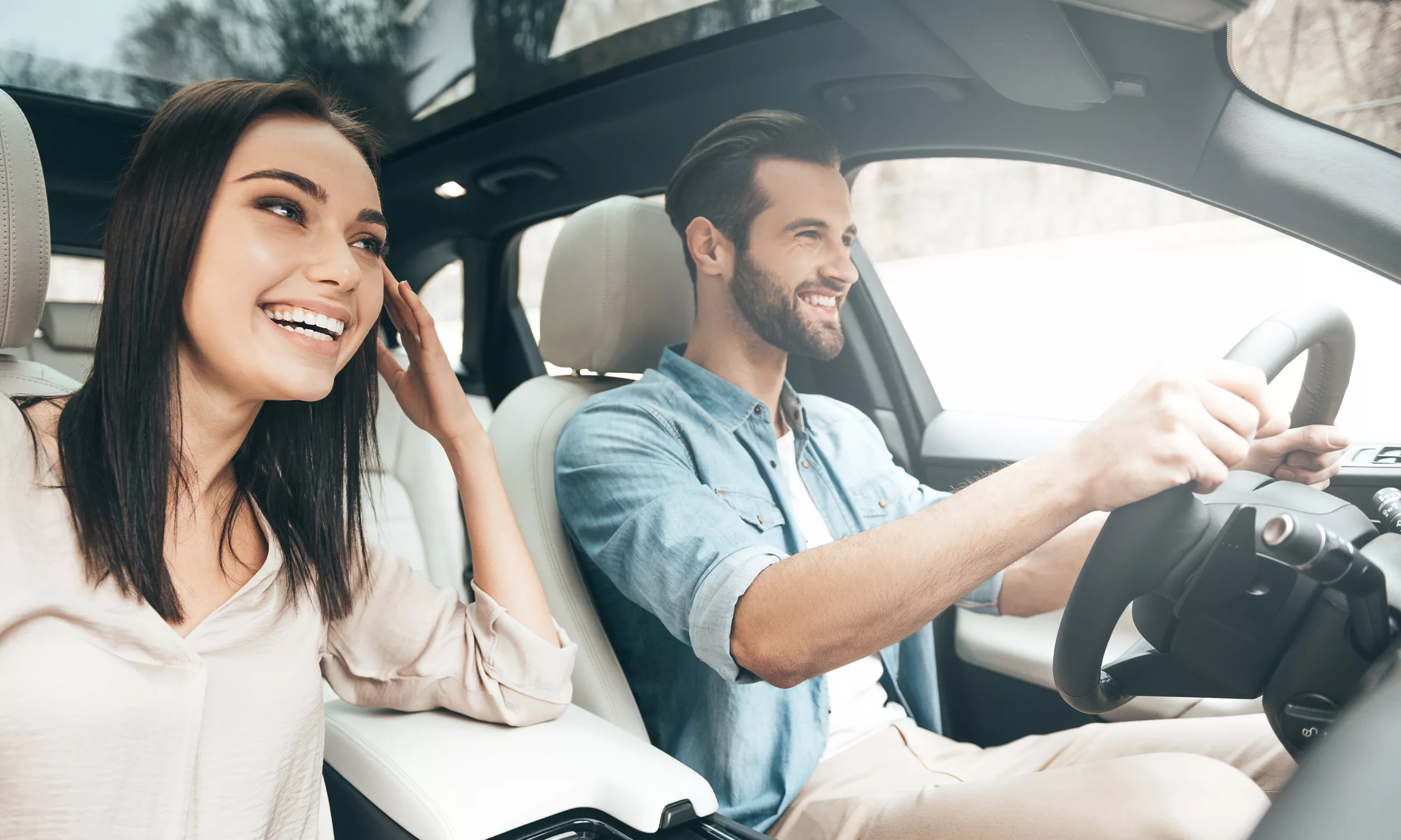 Couple enjoying comfortable ride together in spacious vehicle
