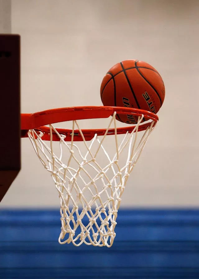 Basketball going through a hoop during a U SPORTS Men's Basketball Final 8 tournament.