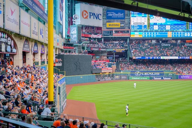 Crowded Minute Maid Park stadium during World Baseball Classic pool game, fans watch from stands.