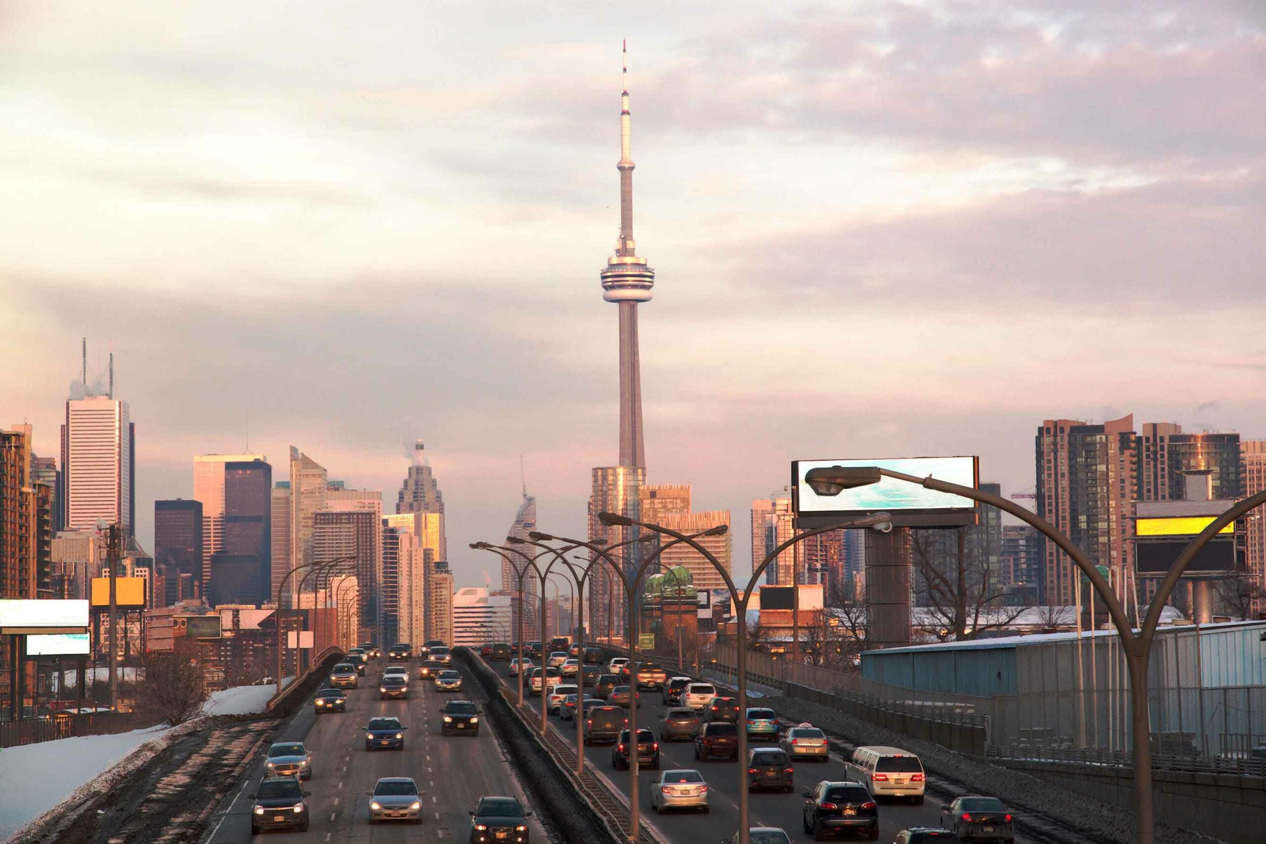 Rent a car Toronto guide showing vehicle travel on Toronto highways and downtown roads