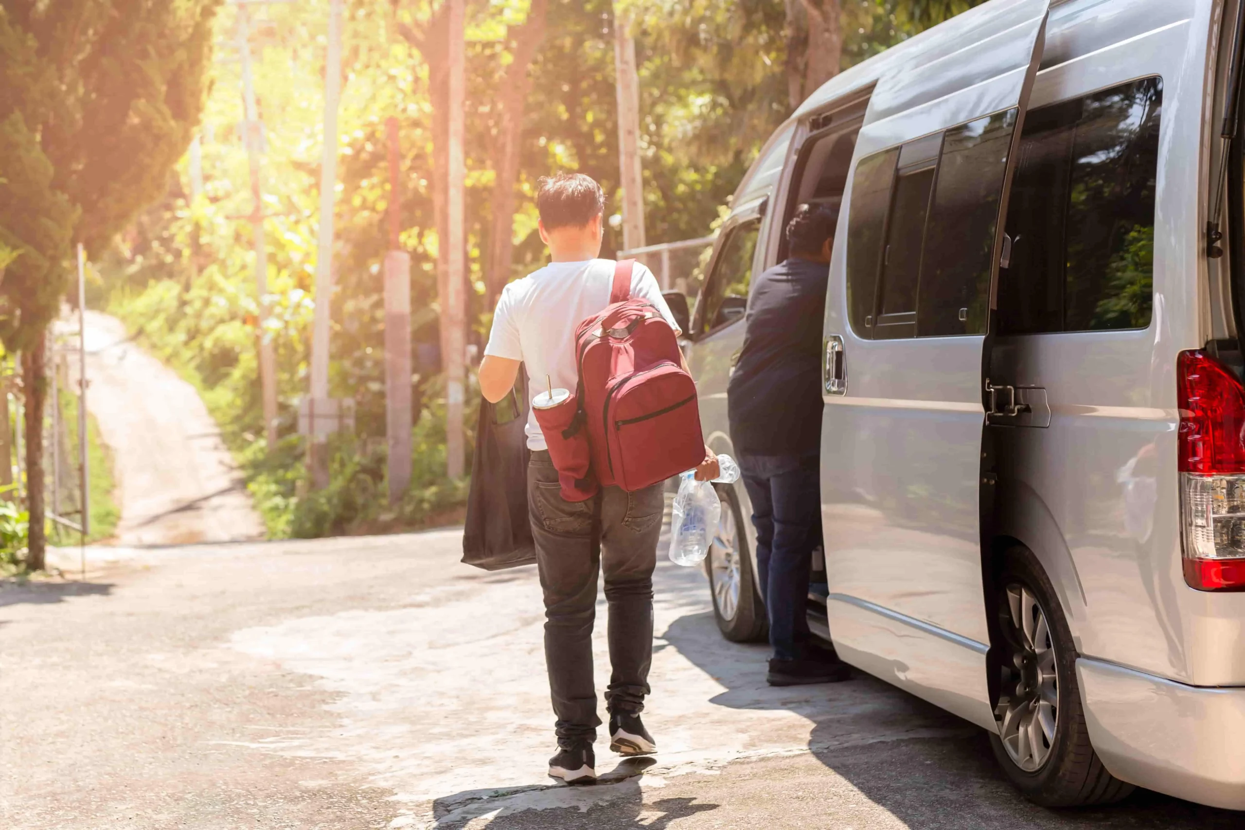 Group car rental featuring a 12-passenger van for family vacation travel